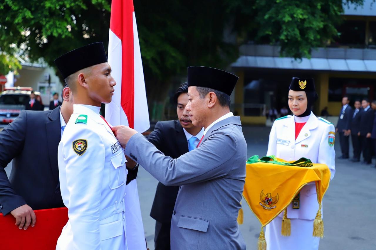 Bupati Kukuhkan 64 Paskibraka Kudus 2025, Siap Kibarkan Sang Saka di HUT RI ke-80